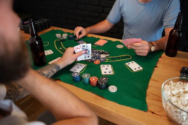 Joker Gaming slot interface on vvp555 platform showing themed game tiles and spin controls